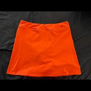 Adidas coral Climalite golf skort.